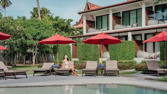 Loungers at Thai Village swimming pool