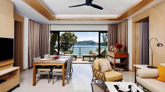 Separate living and dining room in Club Two Bedroom Suite Ocean View Balcony